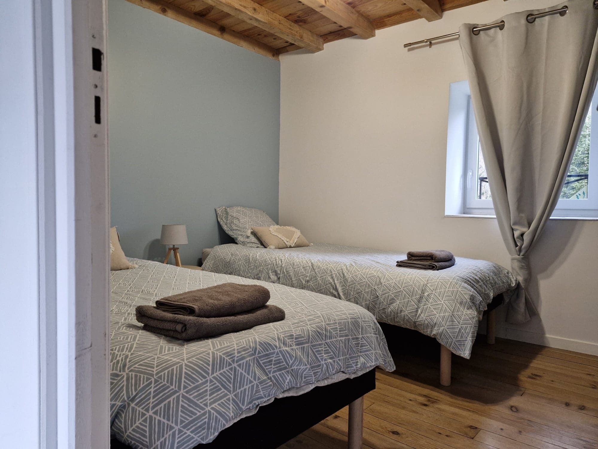 Chambre avec 2 lits simples
