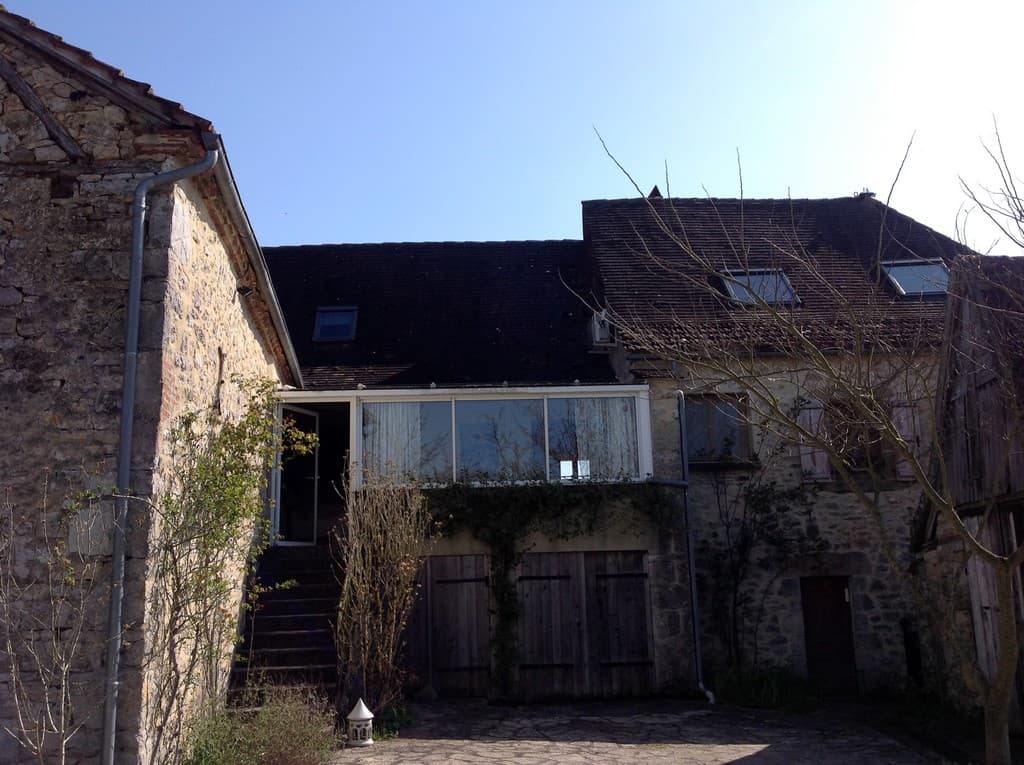 LocationStroink-Liourdres_verandaArriereMaison_14