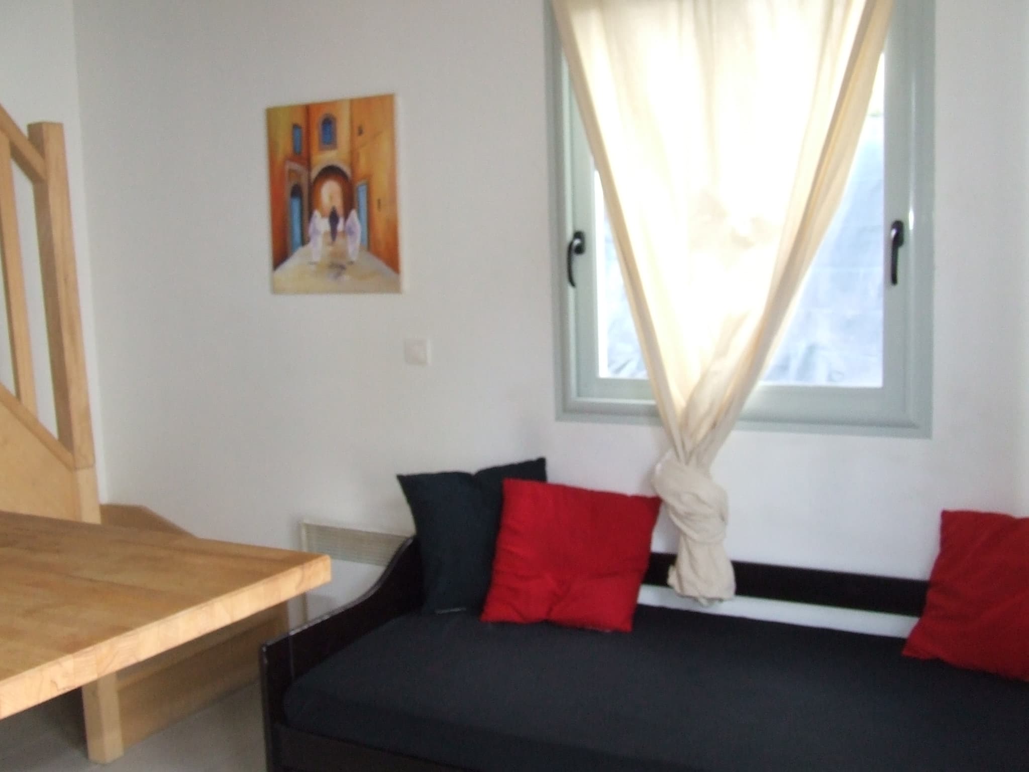 vue canapé + fenêtre côté