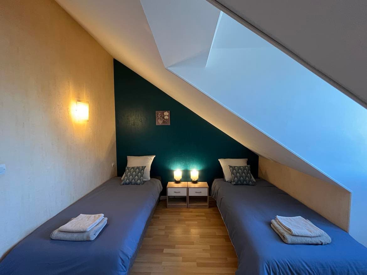 Chambre 1 avec 2 lits simple