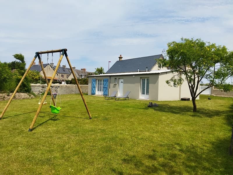 Arrière maison avec balançoire