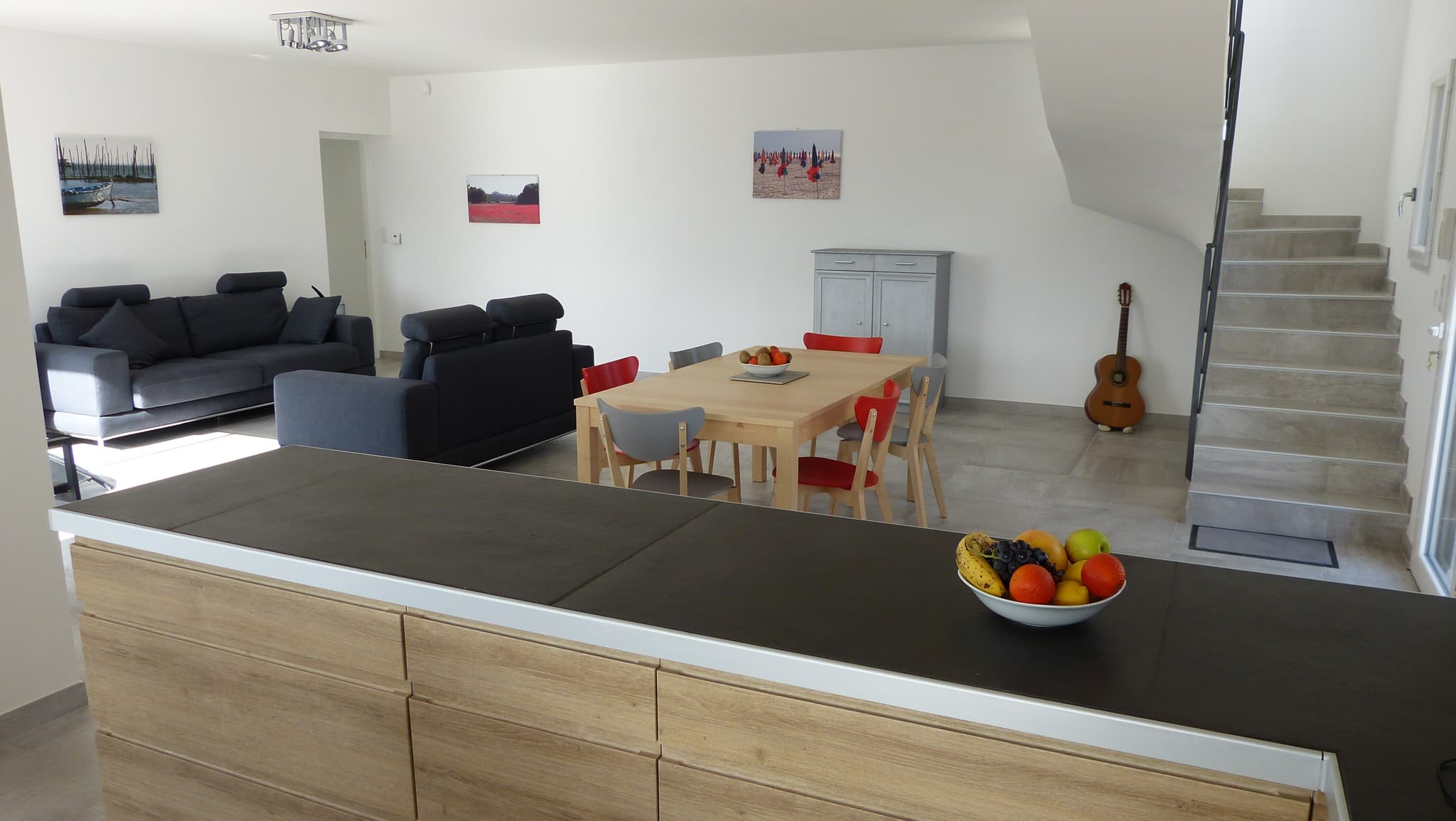 Salon, salle à manger, cuisine américaine 65m²