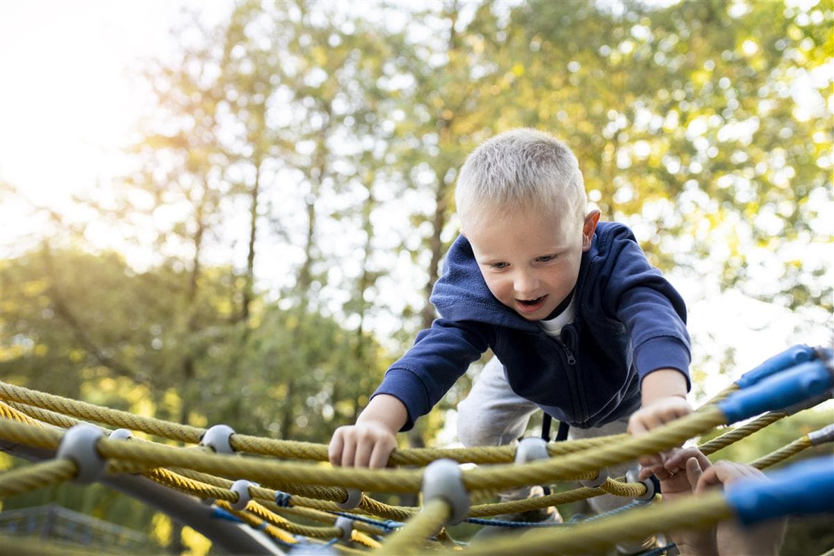 happy-kid-playing-outdoors