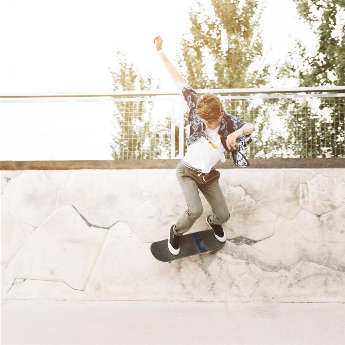 young-skater-boy-skating-half-pipe
