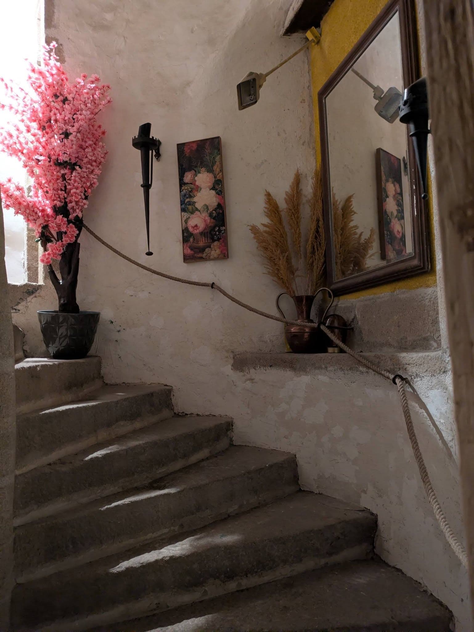 Escalier à vis donnant accès aux chambres