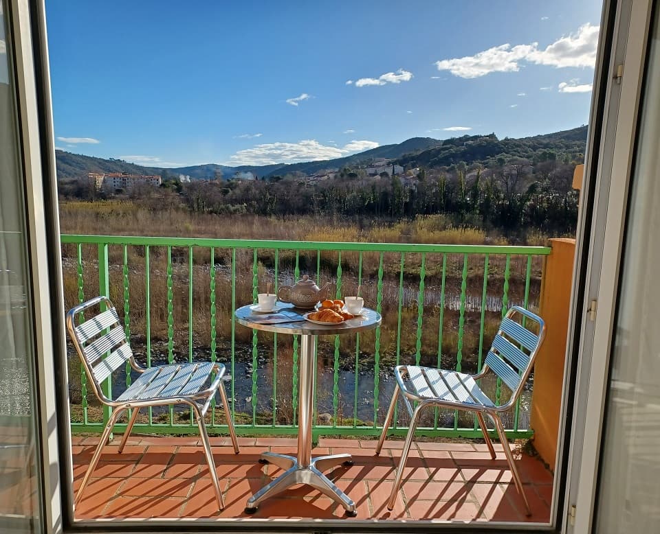 VUE BALCON RIVIERE HIVER