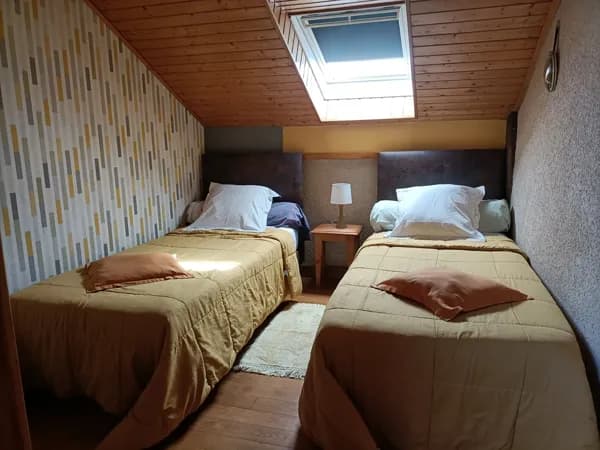 La chambre avec les deux lits 90x200 ou 180x200 suivant la demande des locataires