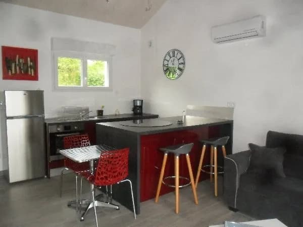cuisine avec ilot central ouvert sur le salon