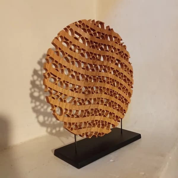 Sculpture "Horizons"
Merisier - D. 19 cm